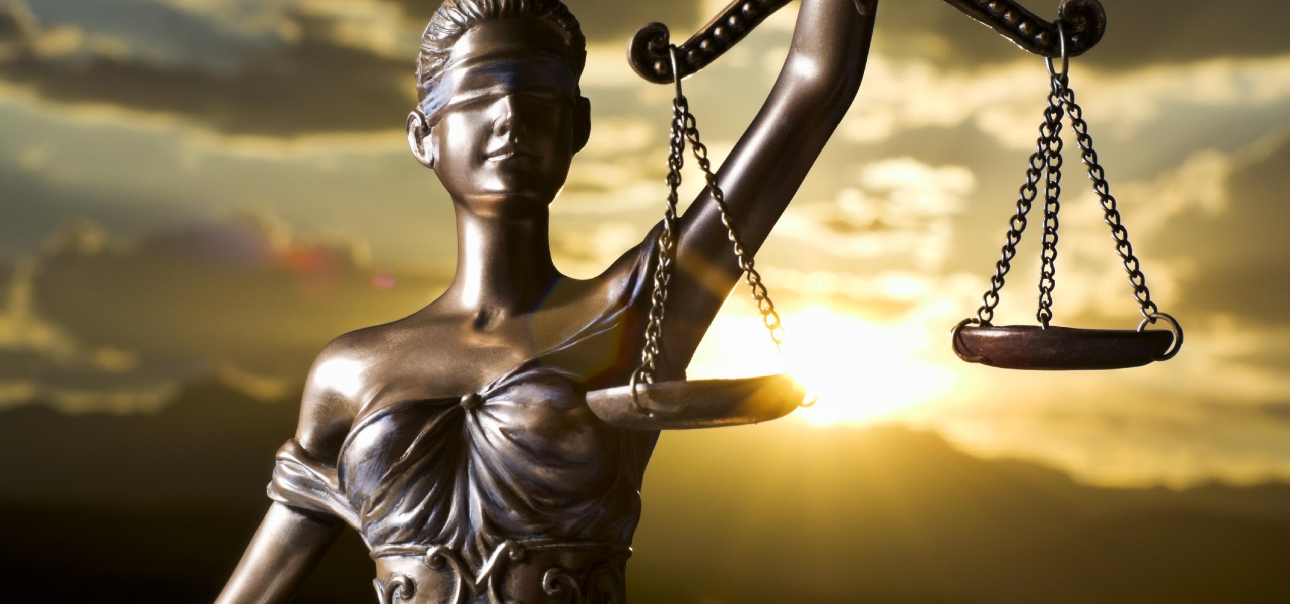 Statue of Lady Justice holding the Scales of Justice